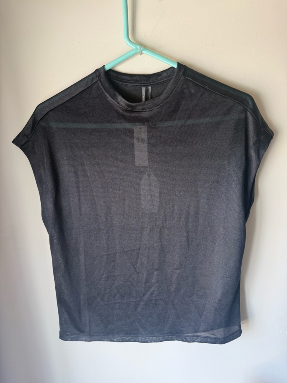 Women's Black Short-Sleeve Crew Neck Shirt. Slightly sheer and NWT